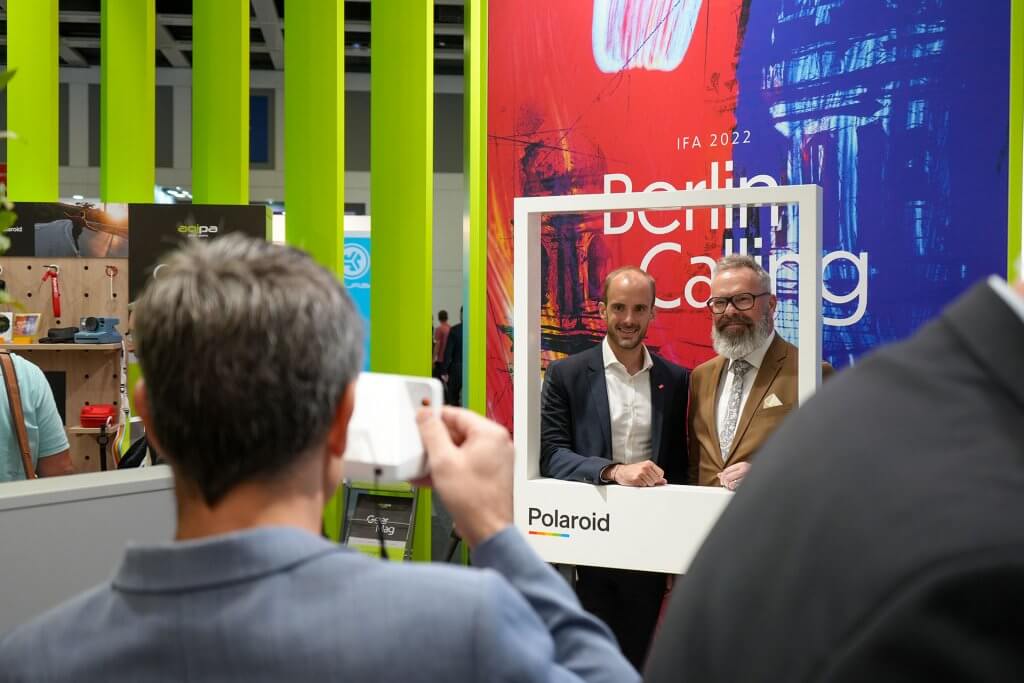 Christian Trapl and Austrian Digital State Secretary Florian Tursky at IFA 2022 with Polaroid frame